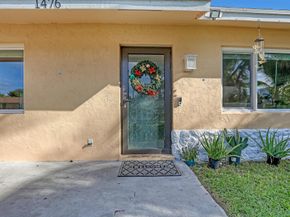 1476 N Mangonia Drive, West Palm Beach FL 33401