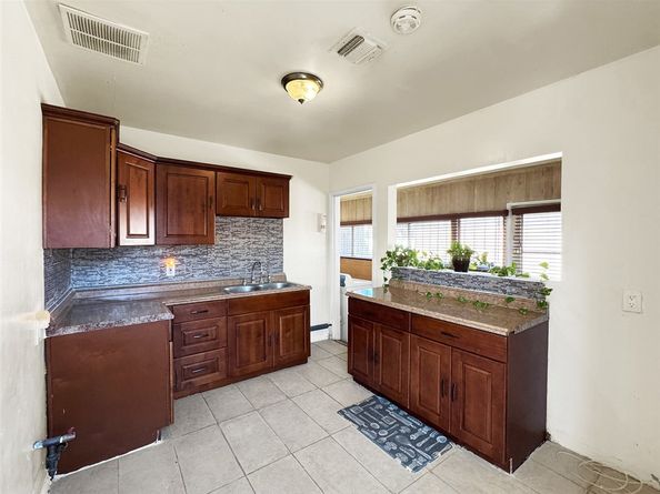 1301 E 106th, Los Angeles CA 90002