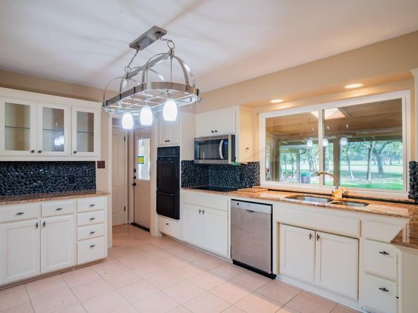 8806 Balcones Club DR, Austin TX 78750