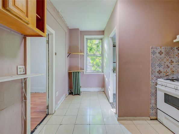 99-11 39th Avenue, Corona NY 11368