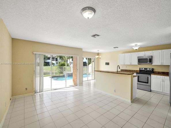 6330 NW 77th Ct, Parkland FL 33067