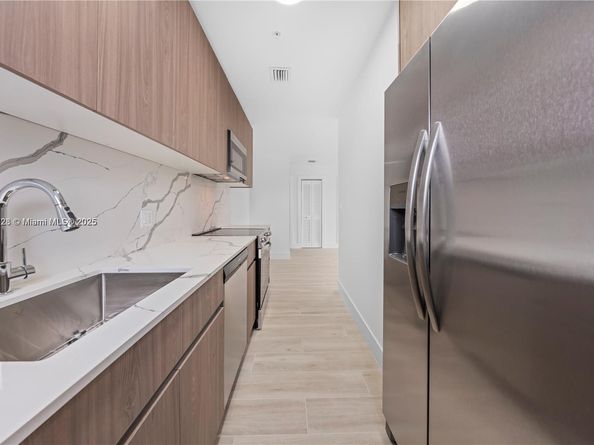 32 NW 14th Ave 103, Miami FL 33125