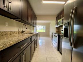 6105 Royal Poinciana Ln, Tamarac FL 33319