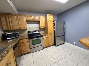 8901 Wiles Road 103, Coral Springs FL 33067