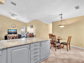 104 Oxford Ct, Royal Palm Beach FL 33411