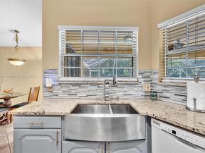 104 Oxford Ct, Royal Palm Beach FL 33411