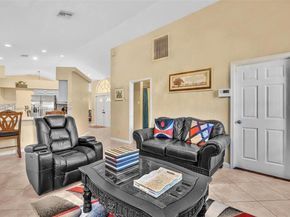 104 Oxford Ct, Royal Palm Beach FL 33411