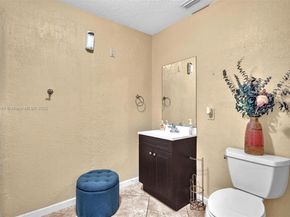 104 Oxford Ct, Royal Palm Beach FL 33411