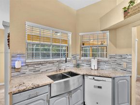 104 Oxford Ct, Royal Palm Beach FL 33411