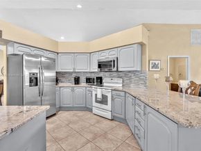 104 Oxford Ct, Royal Palm Beach FL 33411