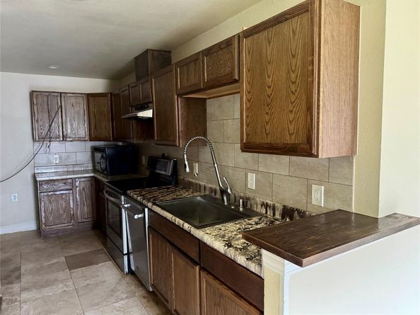 10823  Addie Road , Dallas Texas 75217