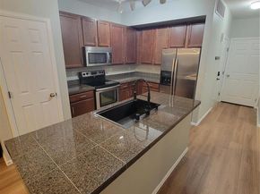 9637 E 5th 103, Denver CO 80230