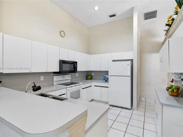 1357 Camellia Ln, Weston FL 33326