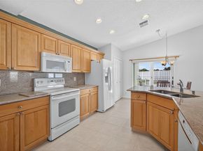 112 Camelot Ct, Royal Palm Beach FL 33411