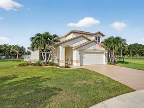 112 Camelot Ct, Royal Palm Beach FL 33411