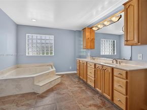 112 Camelot Ct, Royal Palm Beach FL 33411