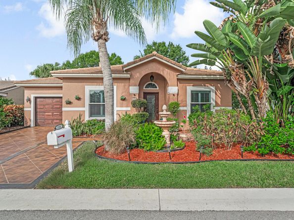 136 Caribe Court, Greenacres FL 33413
