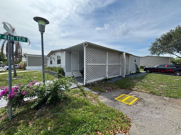 402 NW 50th Court, Deerfield Beach FL 33064