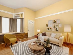 3877 Denker Avenue, Los Angeles CA 90062