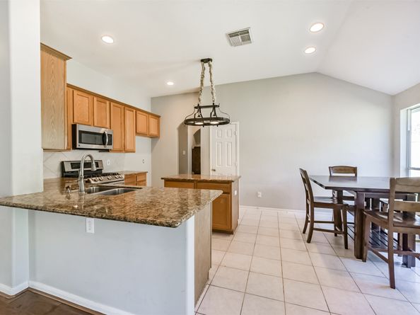 13203 Yaupon Holly Lane, Houston TX 77044