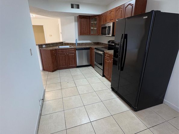 9033 Wiles Rd 202, Coral Springs FL 33067