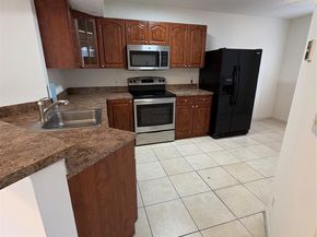 9033 Wiles Rd 202, Coral Springs FL 33067