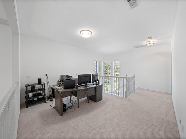 46 Rolling Links Court, The Woodlands TX 77380