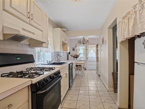 6911 62nd Drive, Middle Village NY 11379