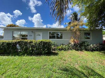 1121 NE 214th St