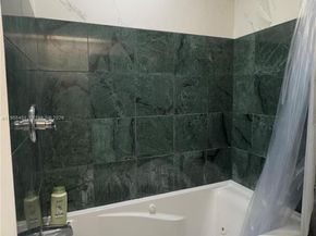 323 W Canterbury Dr W, Riviera Beach FL 33407