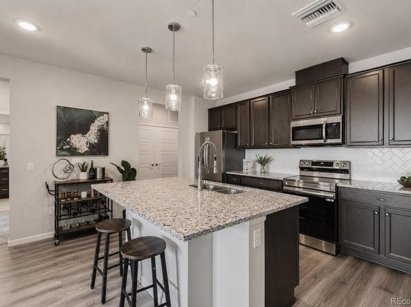6153 N Ceylon Street 10303, Denver CO 80249