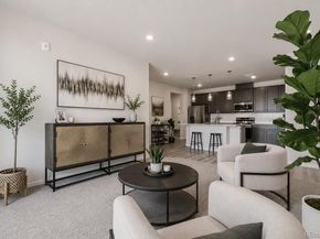 6153 N Ceylon Street 10303, Denver CO 80249