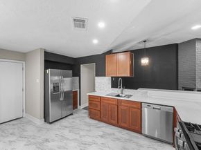 16026 Beechnut Street, Houston TX 77083