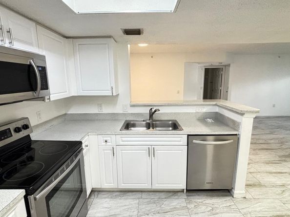 5025 Wiles Road 107, Coconut Creek FL 33073