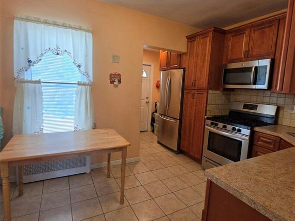 84-11 Sutter Avenue, Ozone Park NY 11417