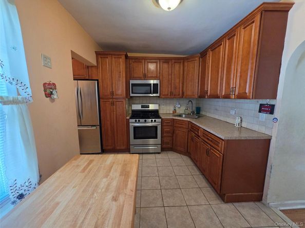 84-11 Sutter Avenue, Ozone Park NY 11417
