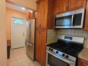 84-11 Sutter Avenue, Ozone Park NY 11417