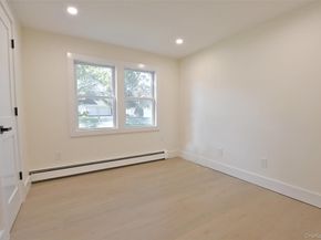 15 Spurwoods Lane, Farmingville NY 11738