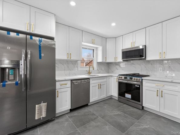 9911 205th Place, Hollis NY 11423