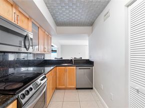 2977 Mcfarlane Rd PH9, Miami FL 33133