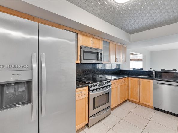 2977 Mcfarlane Rd PH9, Miami FL 33133