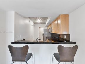 2977 Mcfarlane Rd PH9, Miami FL 33133