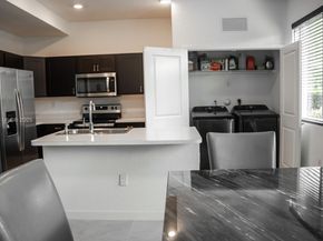 1202 NW 208th Ter, Miami Gardens FL 33169