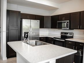 1202 NW 208th Ter, Miami Gardens FL 33169