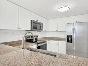 60 NW 37th Ave 1004, Miami FL 33125