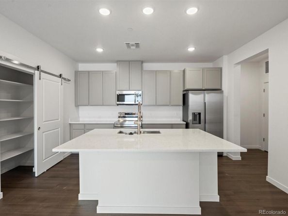 6153 N Ceylon Street 206, Denver CO 80249