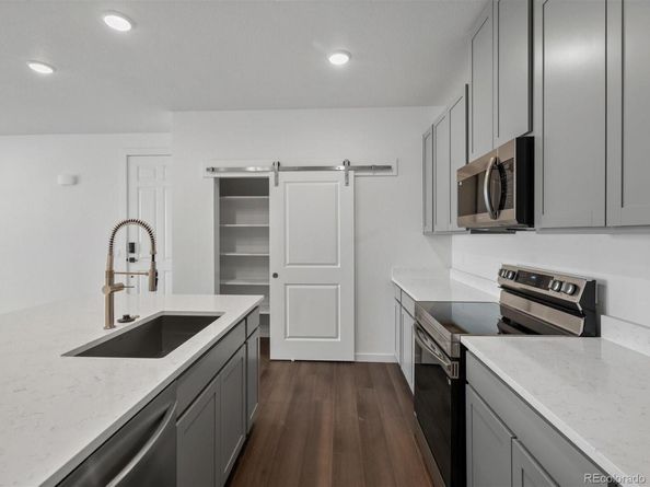 6153 N Ceylon Street 206, Denver CO 80249