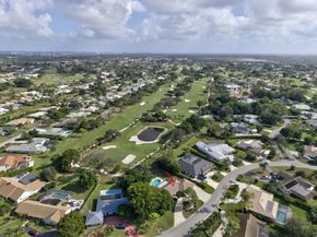 581 S Country Club Drive, Atlantis FL 33462