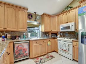 581 S Country Club Drive, Atlantis FL 33462