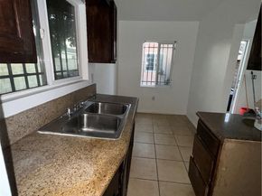 1133 E 76th Place, Los Angeles CA 90001